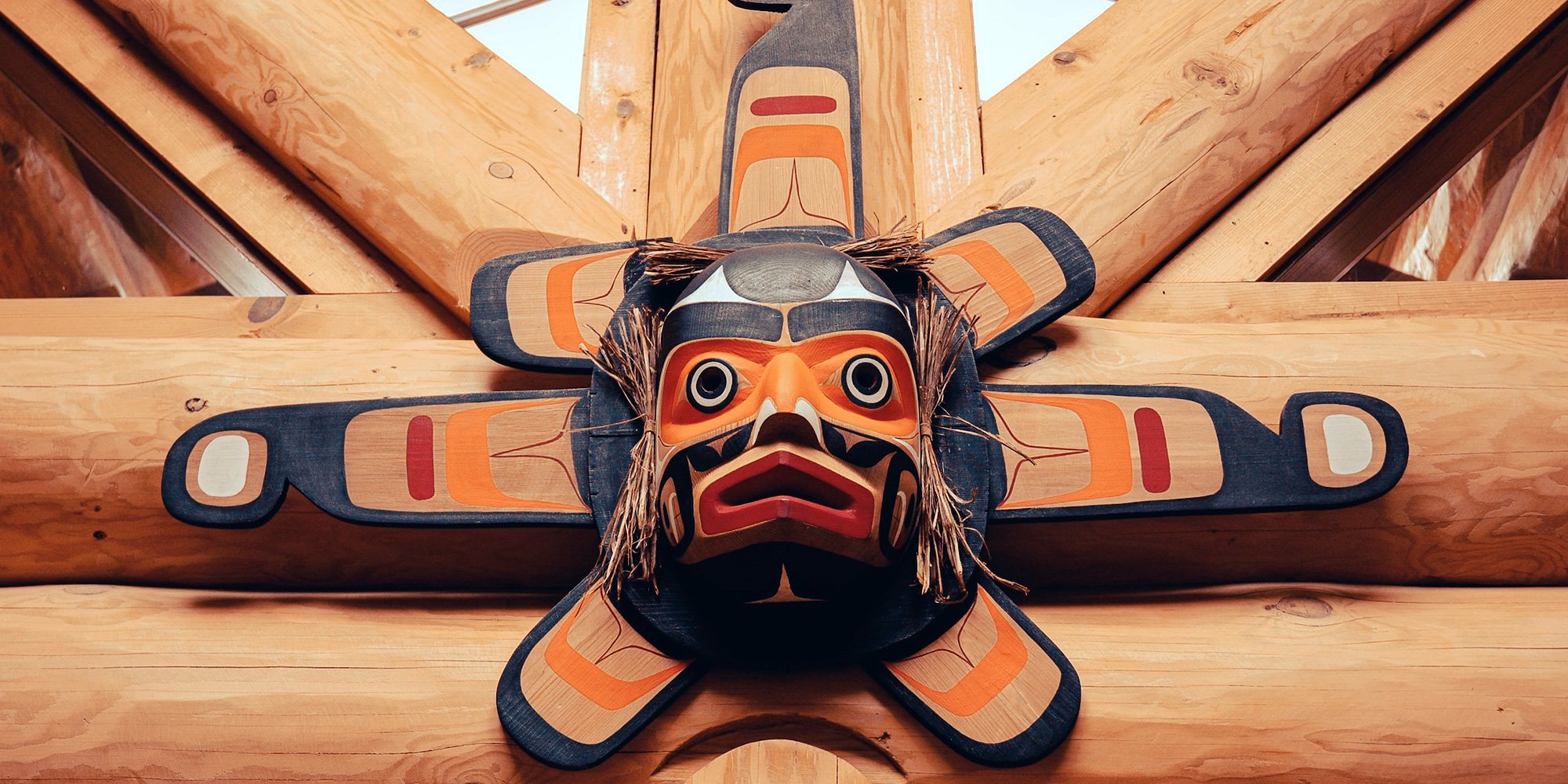 Indigenous mask on wall of cabin