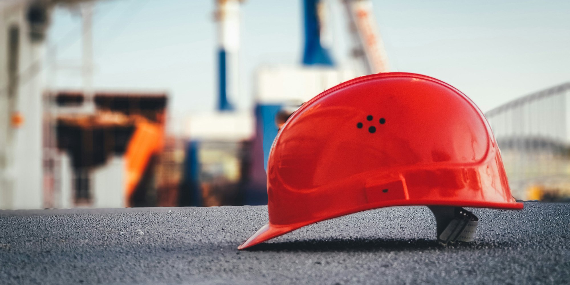 red hardhat on a worksite